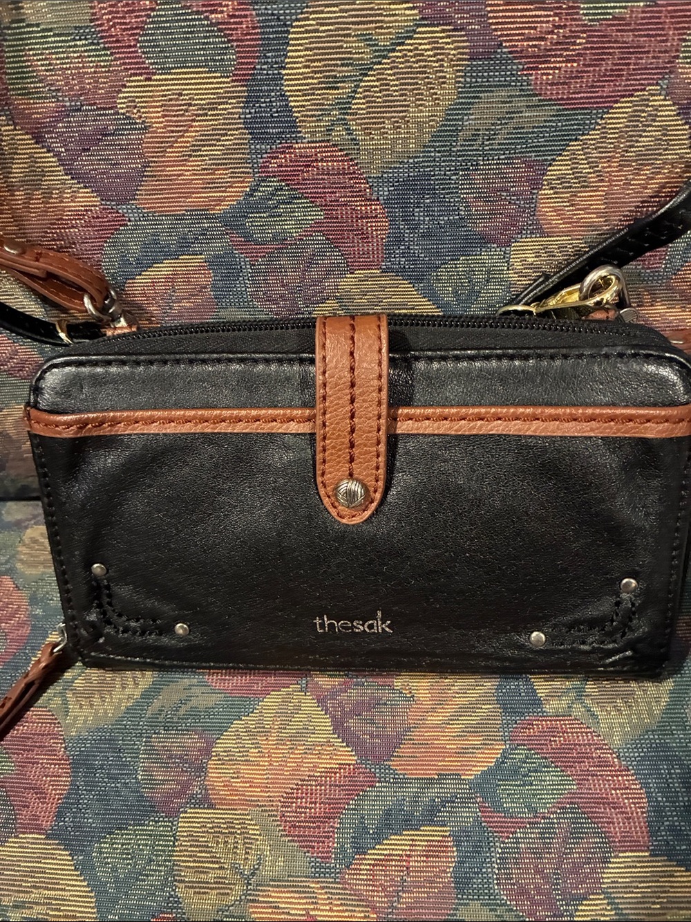 The Sak Black with Brown Trim Crossbody Wallet Bag
